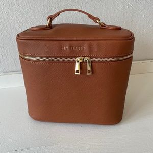 The Everneed Makeup Bag in Saddle